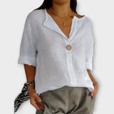 Nicole - Bézs elegáns blúz V-nyakkal